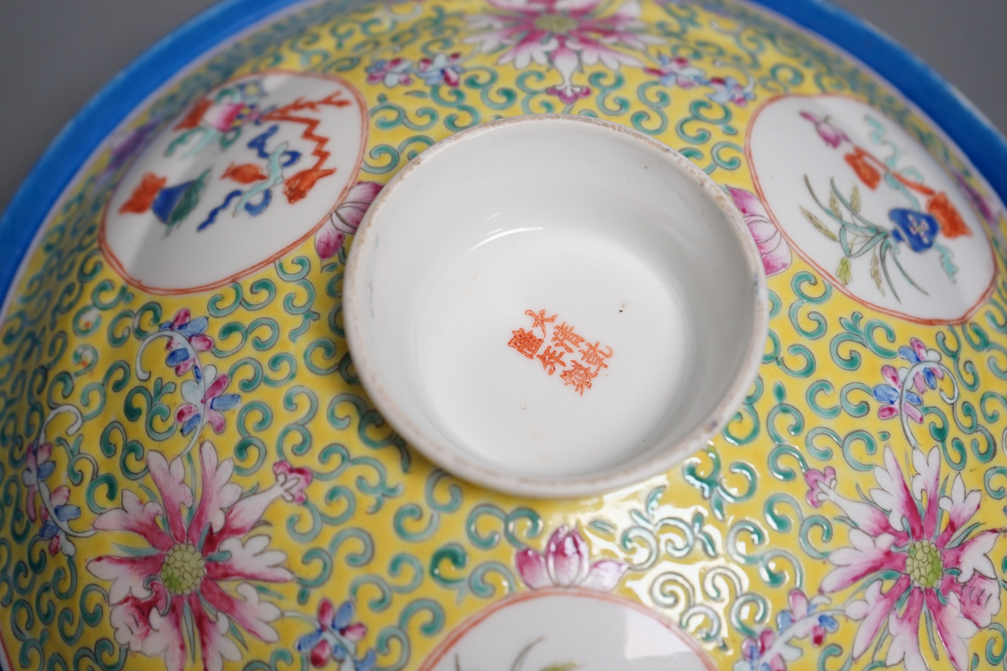 A large Chinese famille rose yellow ground bowl and cover, Republic period, 25cm diameter